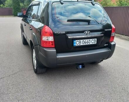 Черный Хендай Туксон, объемом двигателя 2 л и пробегом 168 тыс. км за 9000 $, фото 9 на Automoto.ua