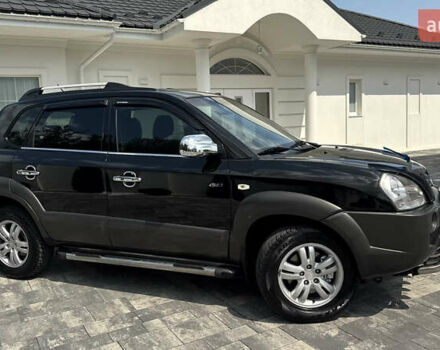 Черный Хендай Туксон, объемом двигателя 2 л и пробегом 67 тыс. км за 9999 $, фото 1 на Automoto.ua