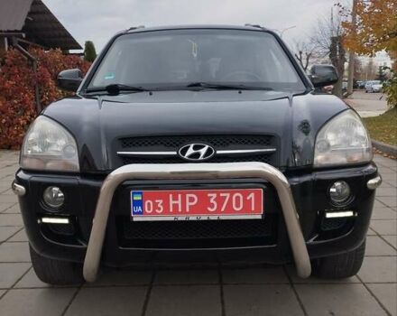 Черный Хендай Туксон, объемом двигателя 1.98 л и пробегом 214 тыс. км за 7700 $, фото 34 на Automoto.ua