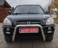 Черный Хендай Туксон, объемом двигателя 1.98 л и пробегом 214 тыс. км за 7700 $, фото 34 на Automoto.ua