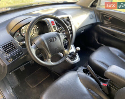 Хендай Туксон 2008 у Рівному на Automoto.ua Чорний Хендай Туксон, об'ємом двигуна 2 л та пробігом 165 тис. км за 7800 $, фото 11 на Automoto.ua