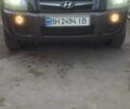 Чорний Хендай Туксон, об'ємом двигуна 2 л та пробігом 214 тис. км за 6000 $, фото 2 на Automoto.ua