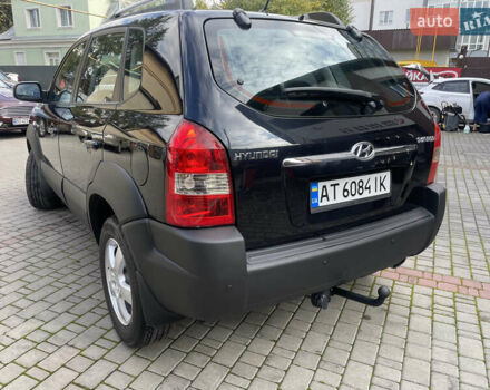 Черный Хендай Туксон, объемом двигателя 1.98 л и пробегом 177 тыс. км за 7600 $, фото 12 на Automoto.ua
