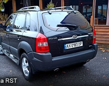 Чорний Хендай Туксон, об'ємом двигуна 2 л та пробігом 188 тис. км за 8800 $, фото 3 на Automoto.ua