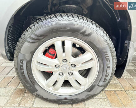 Чорний Хендай Туксон, об'ємом двигуна 2.66 л та пробігом 395 тис. км за 9950 $, фото 13 на Automoto.ua