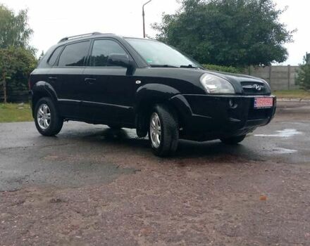 Чорний Хендай Туксон, об'ємом двигуна 2 л та пробігом 225 тис. км за 7850 $, фото 16 на Automoto.ua