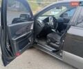 Черный Хендай Туксон, объемом двигателя 1.98 л и пробегом 157 тыс. км за 7500 $, фото 9 на Automoto.ua