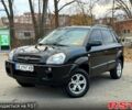 Черный Хендай Туксон, объемом двигателя 2 л и пробегом 157 тыс. км за 7500 $, фото 1 на Automoto.ua