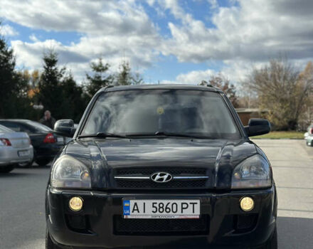 Черный Хендай Туксон, объемом двигателя 2 л и пробегом 300 тыс. км за 8300 $, фото 3 на Automoto.ua