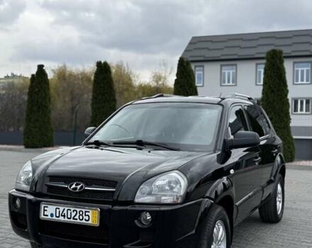 Черный Хендай Туксон, объемом двигателя 1.98 л и пробегом 239 тыс. км за 8700 $, фото 1 на Automoto.ua