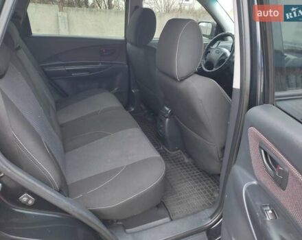 Черный Хендай Туксон, объемом двигателя 2 л и пробегом 237 тыс. км за 7500 $, фото 16 на Automoto.ua