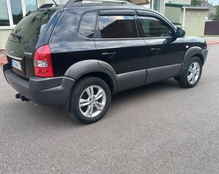 Черный Хендай Туксон, объемом двигателя 2 л и пробегом 168 тыс. км за 9000 $, фото 6 на Automoto.ua