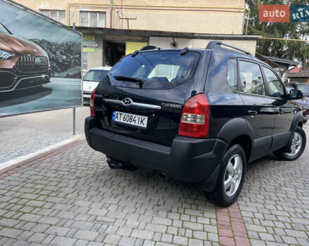 Черный Хендай Туксон, объемом двигателя 1.98 л и пробегом 177 тыс. км за 7600 $, фото 9 на Automoto.ua