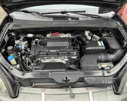 Черный Хендай Туксон, объемом двигателя 2 л и пробегом 270 тыс. км за 7600 $, фото 6 на Automoto.ua