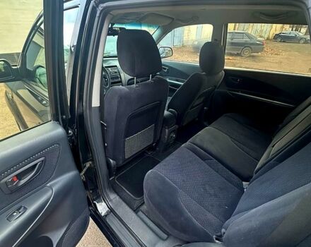 Черный Хендай Туксон, объемом двигателя 2 л и пробегом 215 тыс. км за 6700 $, фото 7 на Automoto.ua