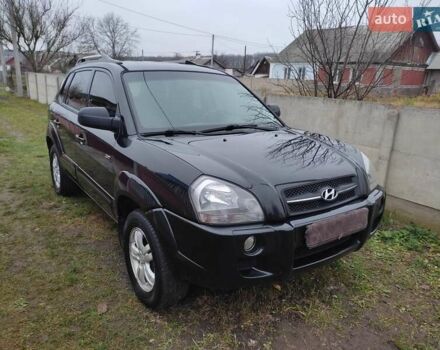Черный Хендай Туксон, объемом двигателя 2 л и пробегом 237 тыс. км за 7500 $, фото 7 на Automoto.ua