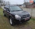 Черный Хендай Туксон, объемом двигателя 2 л и пробегом 237 тыс. км за 7500 $, фото 7 на Automoto.ua