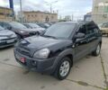 Черный Хендай Туксон, объемом двигателя 2 л и пробегом 214 тыс. км за 7690 $, фото 1 на Automoto.ua