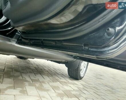 Чорний Хендай Туксон, об'ємом двигуна 2 л та пробігом 225 тис. км за 8000 $, фото 50 на Automoto.ua