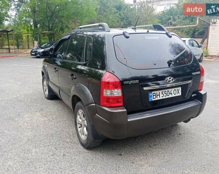 Черный Хендай Туксон, объемом двигателя 1.98 л и пробегом 157 тыс. км за 7500 $, фото 8 на Automoto.ua