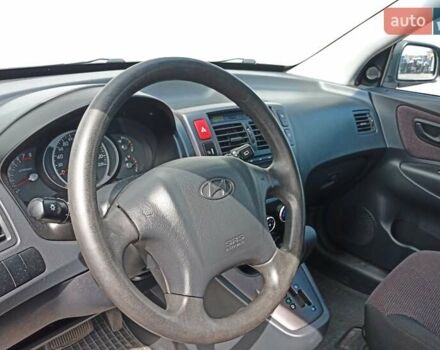 Чорний Хендай Туксон, об'ємом двигуна 1.98 л та пробігом 220 тис. км за 8500 $, фото 9 на Automoto.ua