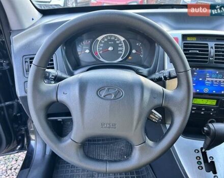 Черный Хендай Туксон, объемом двигателя 2 л и пробегом 230 тыс. км за 7500 $, фото 17 на Automoto.ua