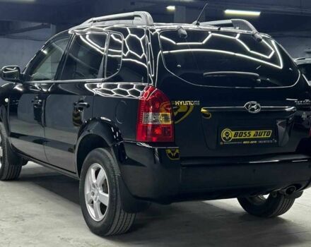 Черный Хендай Туксон, объемом двигателя 2 л и пробегом 224 тыс. км за 7800 $, фото 3 на Automoto.ua