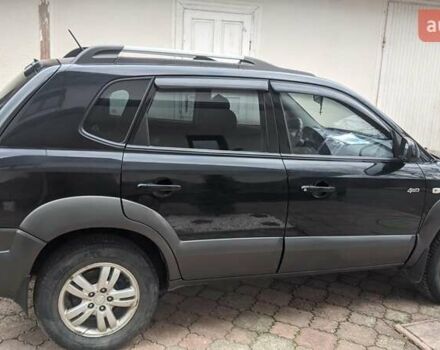 Черный Хендай Туксон, объемом двигателя 2 л и пробегом 163 тыс. км за 8100 $, фото 5 на Automoto.ua