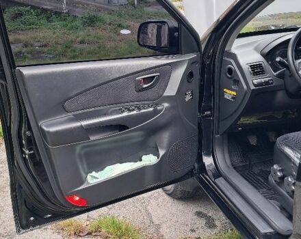 Черный Хендай Туксон, объемом двигателя 2 л и пробегом 270 тыс. км за 8300 $, фото 9 на Automoto.ua