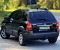Чорний Хендай Туксон, об'ємом двигуна 2 л та пробігом 207 тис. км за 7600 $, фото 7 на Automoto.ua