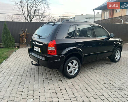 Черный Хендай Туксон, объемом двигателя 2 л и пробегом 276 тыс. км за 7450 $, фото 18 на Automoto.ua