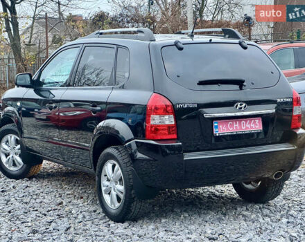 Черный Хендай Туксон, объемом двигателя 1.98 л и пробегом 96 тыс. км за 9900 $, фото 6 на Automoto.ua