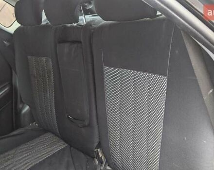 Черный Хендай Туксон, объемом двигателя 2 л и пробегом 163 тыс. км за 8100 $, фото 16 на Automoto.ua