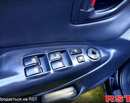 Черный Хендай Туксон, объемом двигателя 2 л и пробегом 187 тыс. км за 7900 $, фото 9 на Automoto.ua