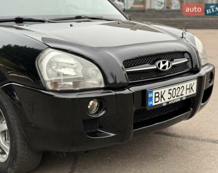 Черный Хендай Туксон, объемом двигателя 1.99 л и пробегом 240 тыс. км за 7200 $, фото 13 на Automoto.ua