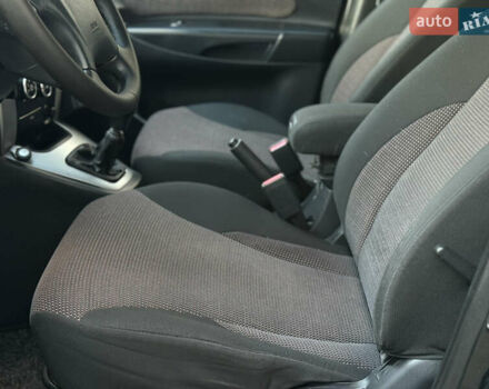 Чорний Хендай Туксон, об'ємом двигуна 2 л та пробігом 156 тис. км за 7850 $, фото 50 на Automoto.ua
