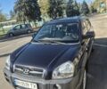 Черный Хендай Туксон, объемом двигателя 1.98 л и пробегом 93 тыс. км за 11800 $, фото 9 на Automoto.ua