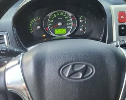 Черный Хендай Туксон, объемом двигателя 2 л и пробегом 197 тыс. км за 8000 $, фото 5 на Automoto.ua