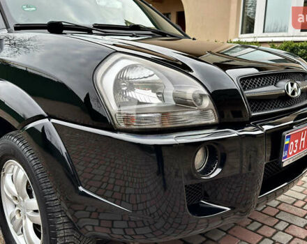 Чорний Хендай Туксон, об'ємом двигуна 2 л та пробігом 182 тис. км за 8299 $, фото 82 на Automoto.ua