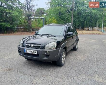 Черный Хендай Туксон, объемом двигателя 1.98 л и пробегом 157 тыс. км за 7500 $, фото 3 на Automoto.ua