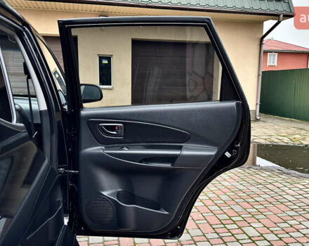 Чорний Хендай Туксон, об'ємом двигуна 2 л та пробігом 182 тис. км за 8299 $, фото 33 на Automoto.ua