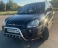 Чорний Хендай Туксон, об'ємом двигуна 1.99 л та пробігом 257 тис. км за 8300 $, фото 1 на Automoto.ua