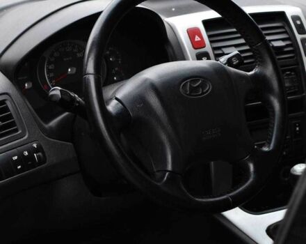 Чорний Хендай Туксон, об'ємом двигуна 2 л та пробігом 204 тис. км за 8650 $, фото 9 на Automoto.ua