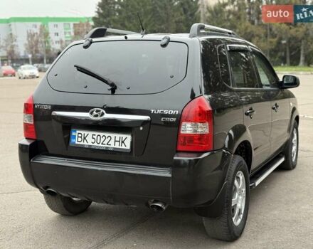 Черный Хендай Туксон, объемом двигателя 1.99 л и пробегом 240 тыс. км за 7200 $, фото 17 на Automoto.ua