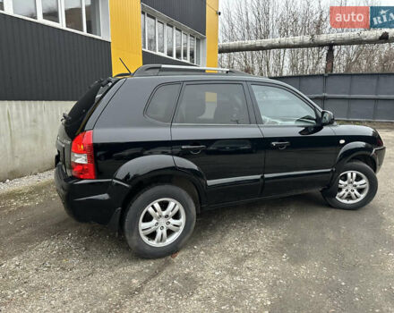Чорний Хендай Туксон, об'ємом двигуна 2 л та пробігом 243 тис. км за 7999 $, фото 21 на Automoto.ua