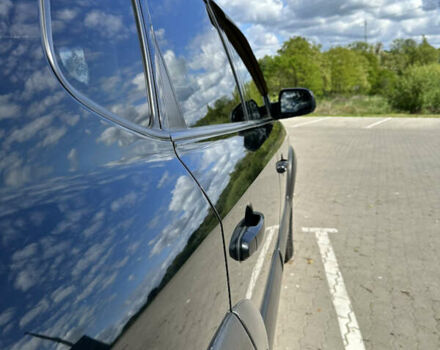 Чорний Хендай Туксон, об'ємом двигуна 1.98 л та пробігом 279 тис. км за 8200 $, фото 8 на Automoto.ua