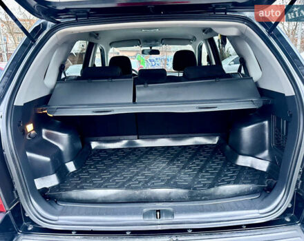 Черный Хендай Туксон, объемом двигателя 1.98 л и пробегом 96 тыс. км за 9900 $, фото 12 на Automoto.ua