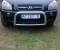 Черный Хендай Туксон, объемом двигателя 2 л и пробегом 185 тыс. км за 8300 $, фото 1 на Automoto.ua