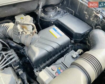 Черный Хендай Туксон, объемом двигателя 1.98 л и пробегом 172 тыс. км за 8500 $, фото 29 на Automoto.ua