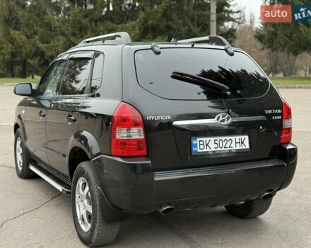 Черный Хендай Туксон, объемом двигателя 1.99 л и пробегом 240 тыс. км за 7200 $, фото 23 на Automoto.ua